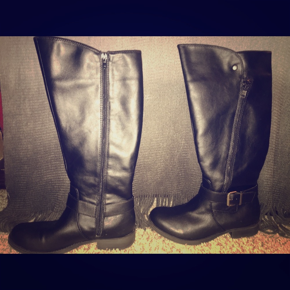 Black tall boots.